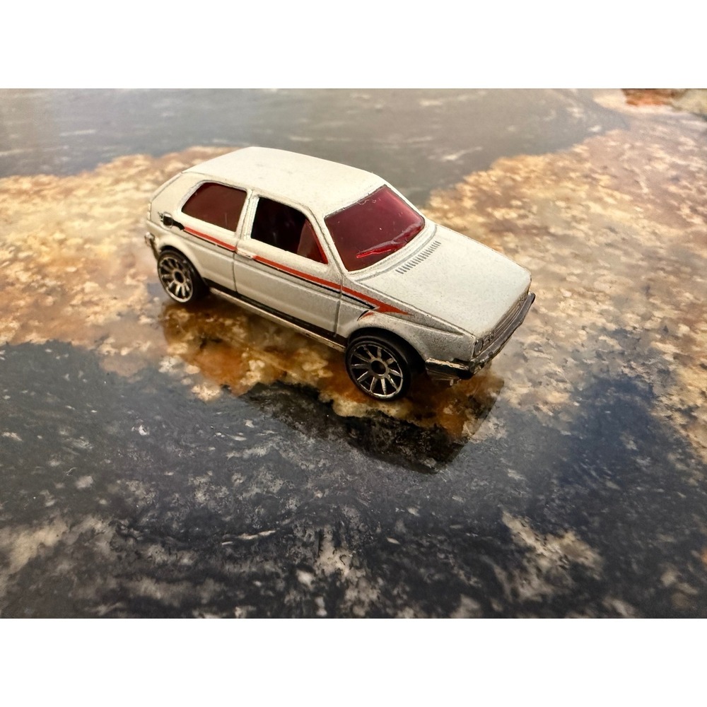 Hot Wheels 1989 Volkswagen Golf GTI White Red Stripe Diecast Toy Car 164 Scale - Picture 2 of 5